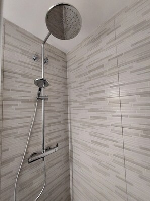 Hair dryer, towels, soap, shampoo