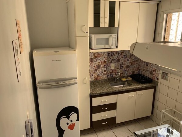 Fridge, stovetop, cookware/dishes/utensils