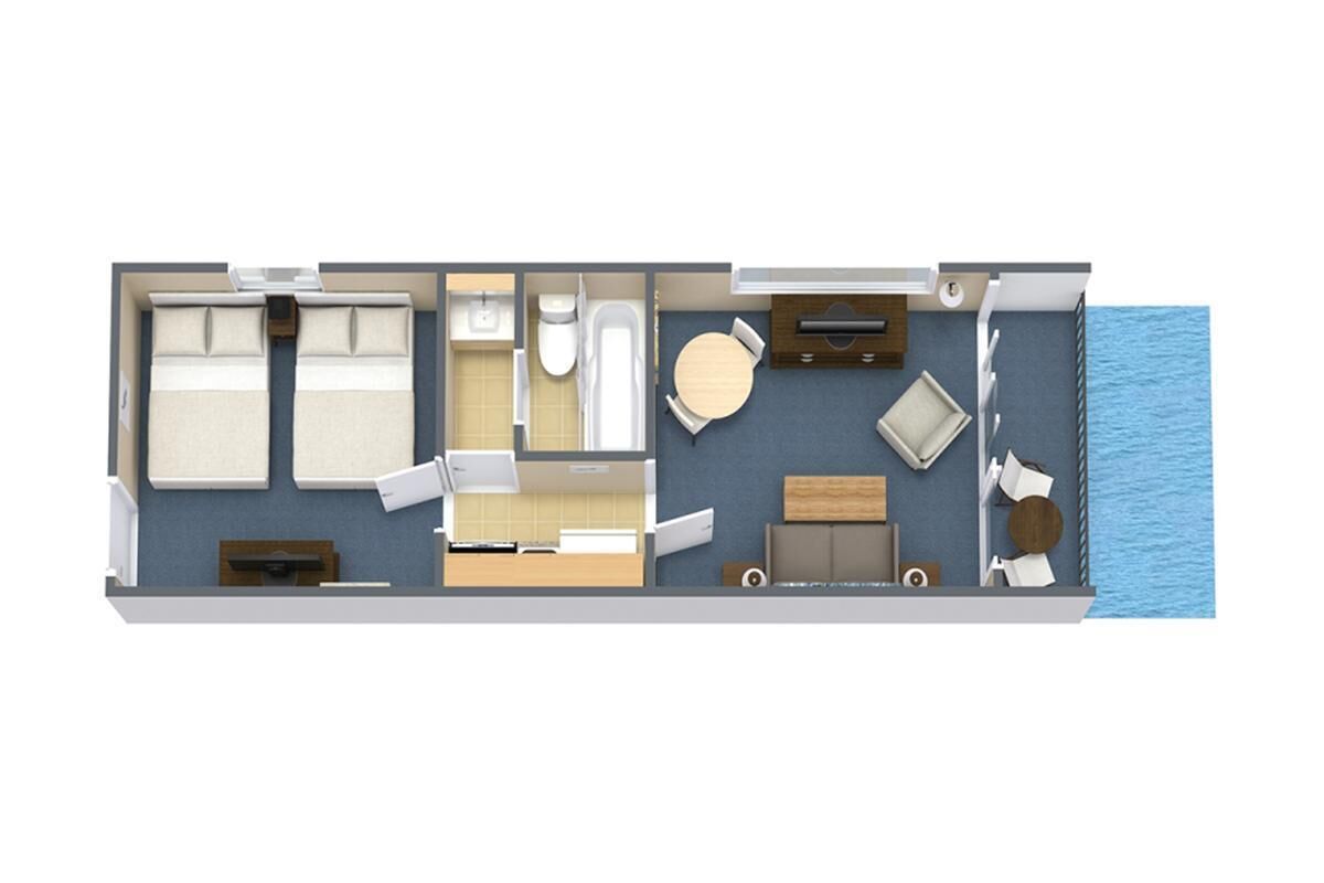Suite de dos habitaciones con balcón, baño, comedor y pequeña cocina.