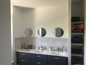 Shower, hair dryer, towels, toilet paper