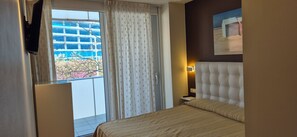 1 bedroom, desk, iron/ironing board, travel cot