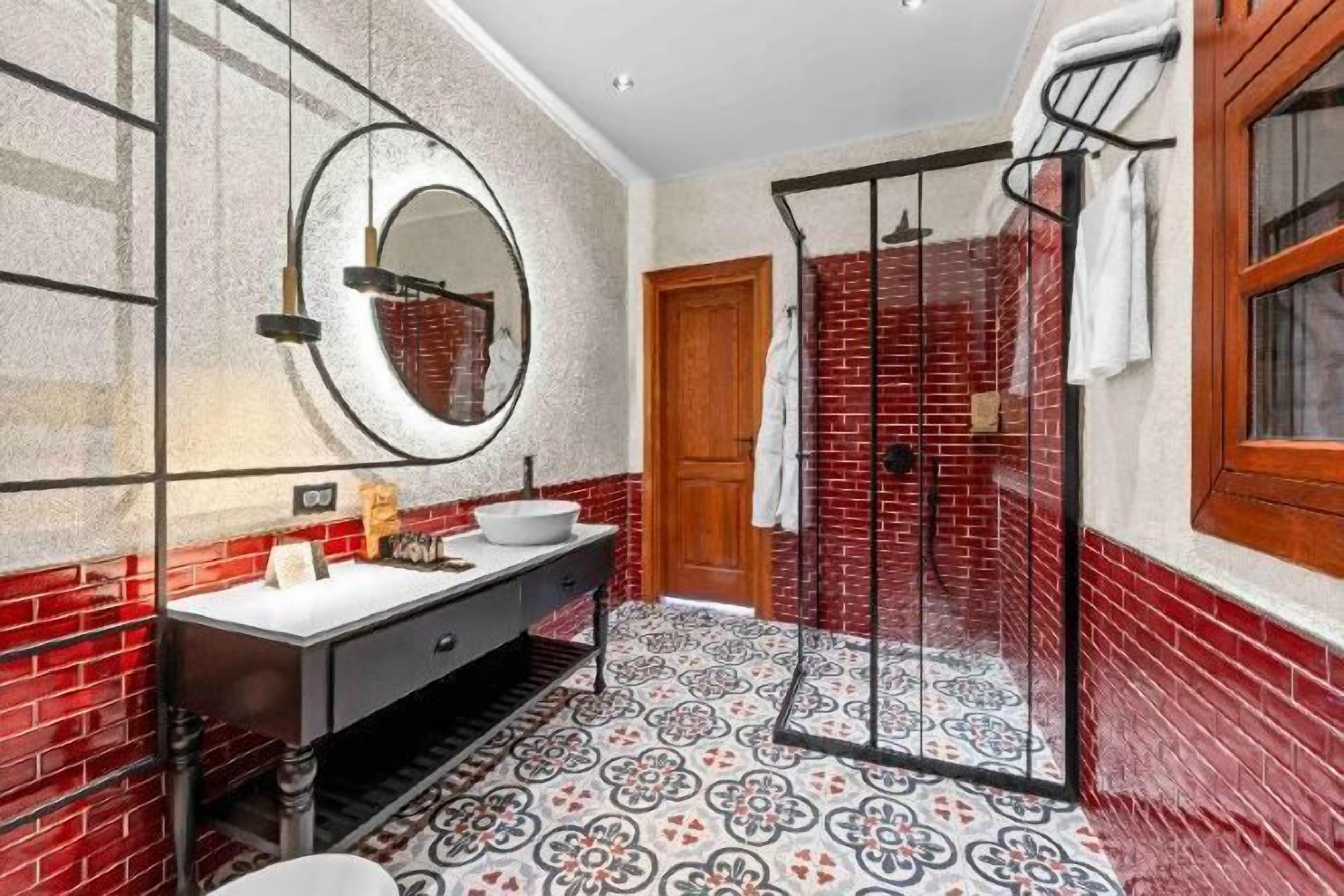 Bathroom | Shower, rainfall showerhead, hair dryer, bathrobes