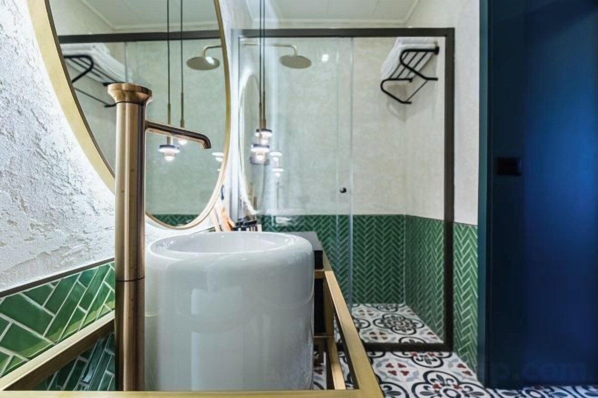 Bathroom | Shower, rainfall showerhead, hair dryer, bathrobes