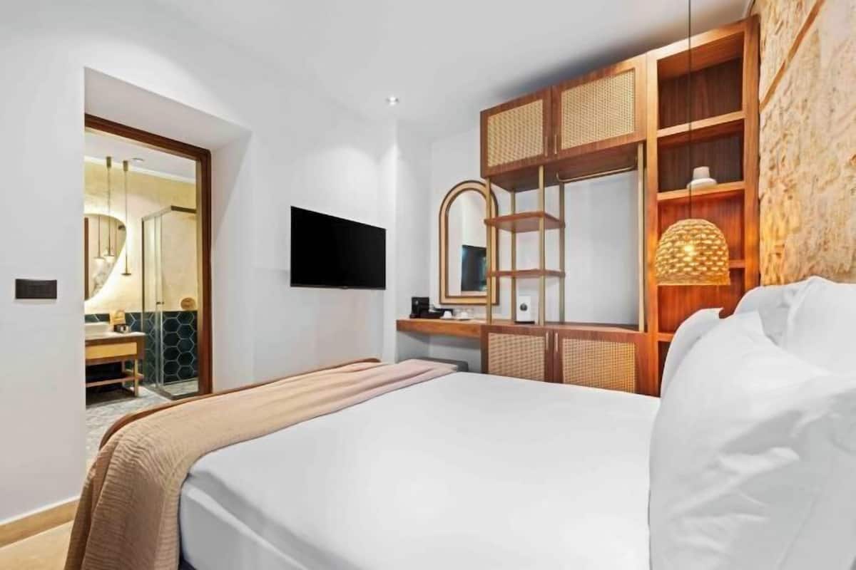 1 Schlafzimmer, hochwertige Bettwaren, Minibar, Zimmersafe