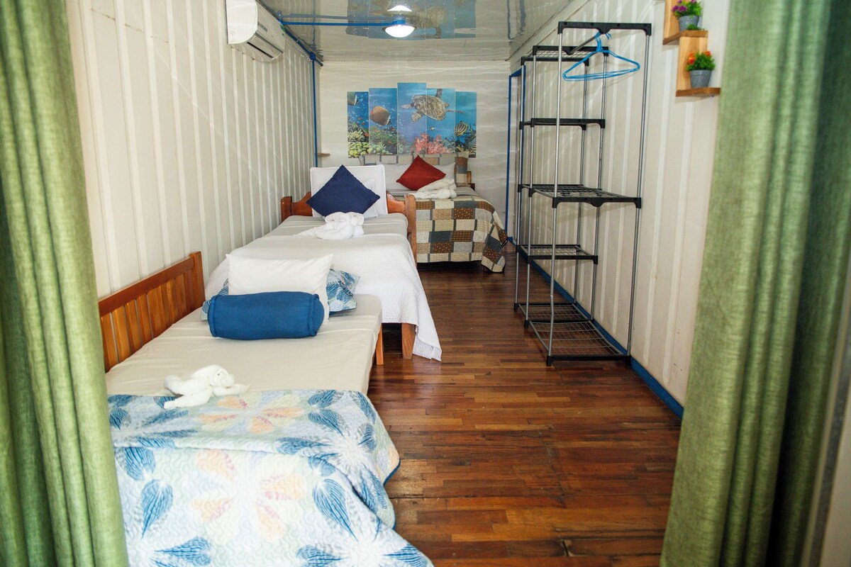 Basic Quadruple Room, Terrace, Beach View | WiFi (free), bed sheets