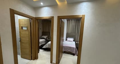 Family-sized Apartment overlooking Coast with easy access to Beach & Medina.