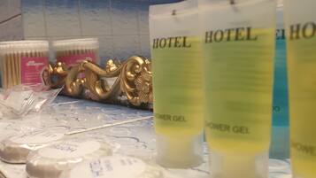 Hair dryer, towels, soap, shampoo