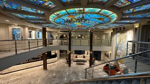 A spacious lobby with a high ceiling, a central stained glass feature, and a marble floor. - Nile Cruise Luxor&Aswon IncludingTours (Luxor)