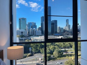 Enjoy a city view from the comfort of your room, with a large window framing the urban landscape.