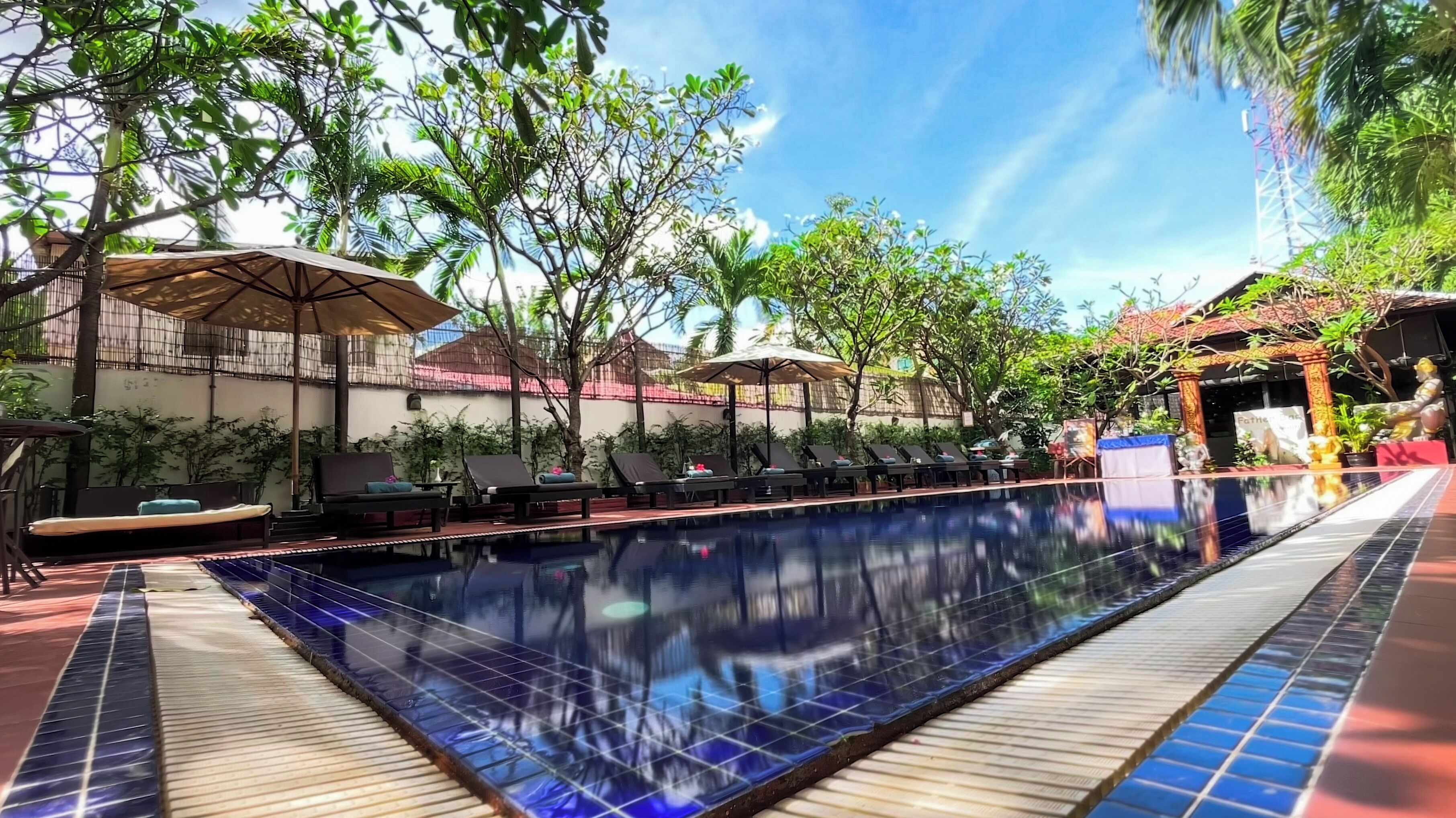 Outdoor pool, open 9:00 AM to 9:00 PM, sun loungers