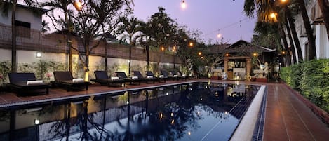 Outdoor pool, open 9:00 AM to 9:00 PM, pool loungers