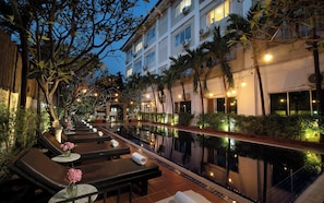 Outdoor pool, open 9:00 AM to 9:00 PM, sun loungers