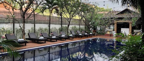 Outdoor pool, open 9:00 AM to 9:00 PM, sun loungers