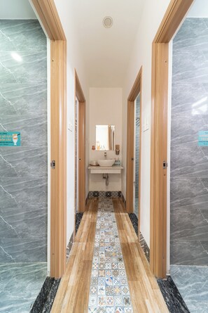 Economy Triple Room | Bathroom | Hair dryer, bidet, towels, toilet paper - Hoi An Lazy Bear Hostel (Da Nang)