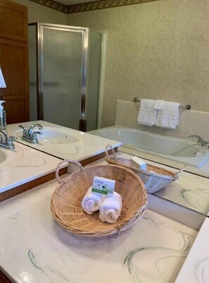 Jetted bath, hair dryer, towels, soap
