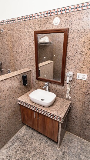 Shower, towels, soap, toilet paper