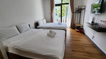 Habitación familiar | Ropa de cama hipoalergénica, minibar, cortinas opacas