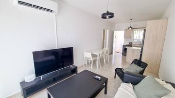 Appartement Standard | Coin séjour | Télévision à écran plat