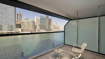 Premier King Room with Balcony | In-room safe, desk, laptop workspace, blackout drapes