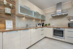 Apartment, 1 Bedroom, 2 Bathrooms | Private kitchen | Microwave, dishwasher, coffee/tea maker, electric kettle - Soft Beige Raniuszka by Renters (Warsaw)