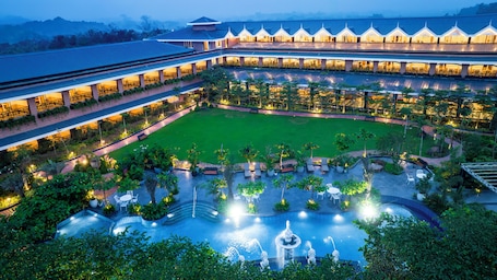 Front of property – evening/night. Mayfair Oasis Resort & Convention