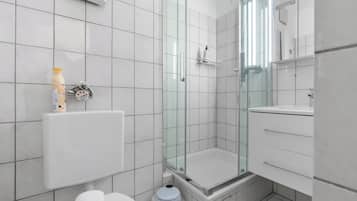 Shower, eco-friendly toiletries, hair dryer, towels