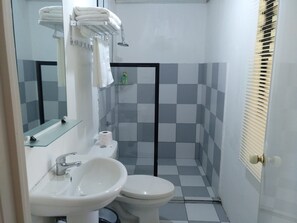 Shower, rainfall showerhead, towels