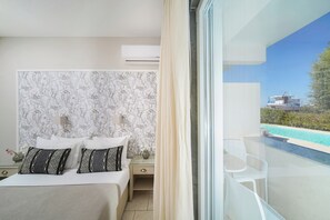 Junior-sviitti | 1 makuuhuone, ylelliset vuodevaatteet, pillowtop-patjalliset sängyt