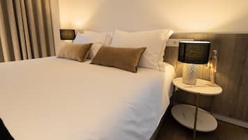 Habitación Deluxe con 1 cama doble o 2 individuales | Cortinas opacas, sistema de insonorización, wifi gratis