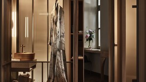 A modern bathroom with a wooden vanity, a sink, and a mirror. - Domus Blanc Boutique Hotel, Member of Domus Elegance Collection (Chania)