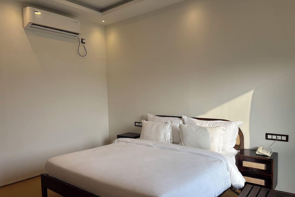 Habitación Elite con 1 cama doble o 2 individuales | 1 dormitorio, ropa de cama de alta calidad, edredones de plumas