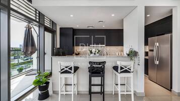 Premium Apartment | Private kitchen | Full-size fridge, microwave, oven, dishwasher