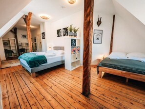 4 bedrooms, desk, iron/ironing board, travel cot