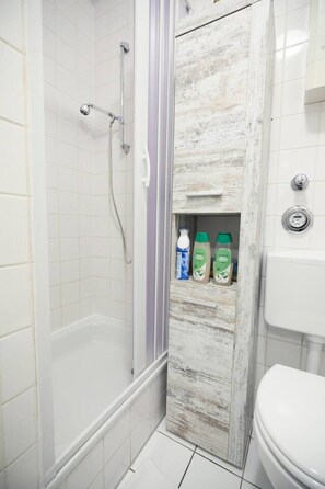 Shower, eco-friendly toiletries, hair dryer, towels