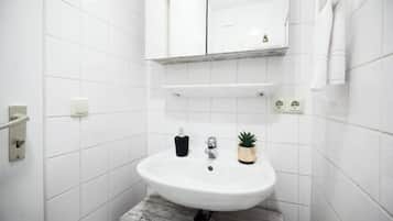 Shower, eco-friendly toiletries, hair dryer, towels