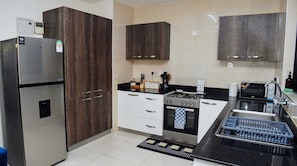 Family Apartment | Private kitchen | Fridge, microwave, cookware/dishes/utensils - Lux Suites Amalia Apartments Syokimau (Syokimau)