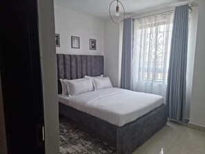 Apartemen Deluks | 2 kamar tidur, Wi-Fi gratis, dan seprai linen