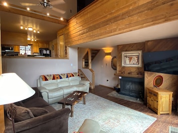 Spacious living room has three recliners and plenty of seating