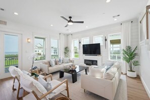 Smart TV, fireplace, books, offices