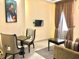 Classic Suite | Living area | 42-inch LED TV with cable channels