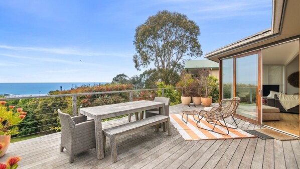 Outdoor dining - Sunrise - Vacation home that invites your family to indulge in the tranquility of beachfront living. (Lorne)