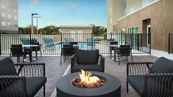 Outdoor pool, open 8:00 AM to 10:00 PM, sun loungers