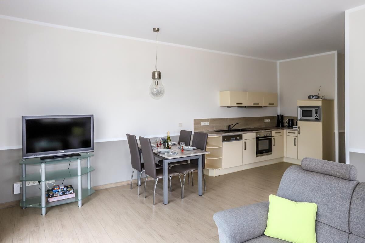 Condo | Living area | Flat-screen TV, heated floors