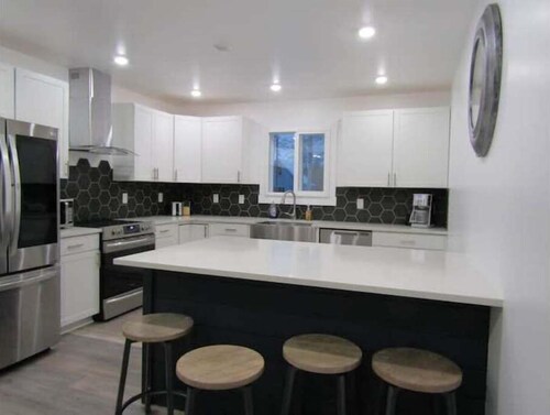 Exceptional Home with Htd Garage in Town