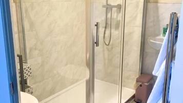 Shower, free toiletries, hair dryer, towels