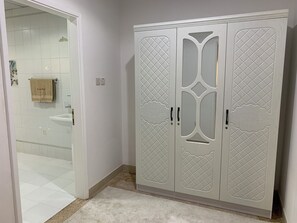 Shower, eco-friendly toiletries, hair dryer, towels