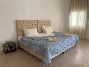 1 dormitorio, tabla de planchar con plancha, wifi gratis y ropa de cama