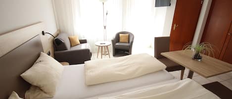 Hypo-allergenic bedding, in-room safe, desk, laptop workspace