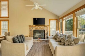 Smart TV, fireplace, books