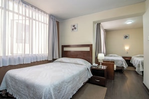 Standard Triple Room | Desk, laptop workspace, free WiFi, bed sheets